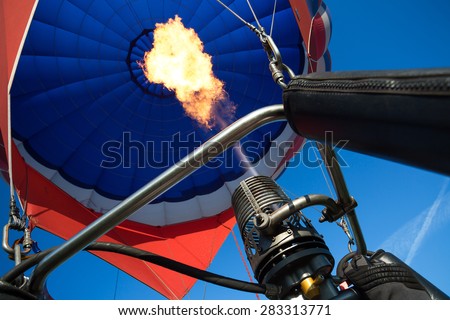 gas burner balloon with fire on the background of the dome