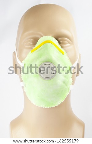plastic mannequin wearing Protective Dust Mask with valve