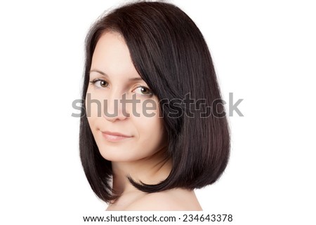 Close-up portrait of young beautiful woman with short hairstyle isolated on white background. Beautiful haircut. Short straight healthy hair. Skin care concept.