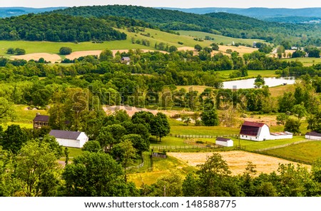 View of hills and farmland in Virginia\'s Piedmont, seen from Sky Meadows State Park.