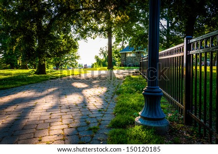 Brick pathway and fence in Federal Hill Park, Baltimore, Maryland.