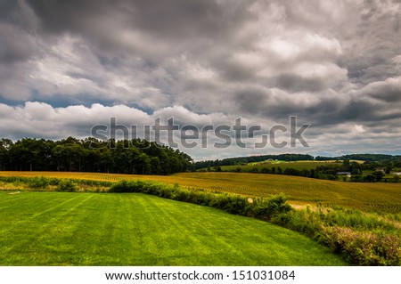 Storm clouds over farm fields in rural York County, Pennsylvania.