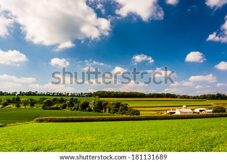 Summer view of rolling hills and farm fields in rural York County, Pennsylvania.