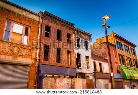 Evening light on abandoned buildings at Old Town Mall, Baltimore, Maryland.