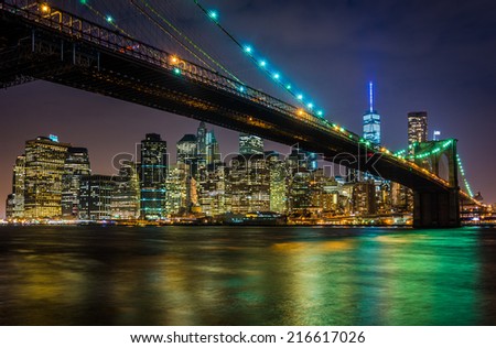 The Brooklyn Bridge and Manhattan Skyline at night seen from Brooklyn Bridge Park, New York.