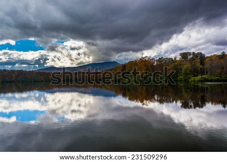 Autumn color and reflections at Julian Price Lake, along the Blue Ridge Parkway, North Carolina.