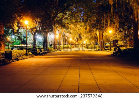 Oak trees and path at night in Forsyth Park, Savannah, Georgia.
