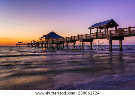 Fishing pier in the Gulf of Mexico at sunset,  Clearwater Beach, Florida.