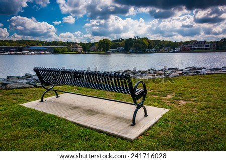 Bench along the shore of the North East River in North East, Maryland.