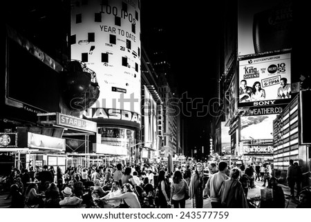 NEW YORK CITY - AUGUST 24, 2014:  Times Square at night in  Midtown Manhattan, New York on August 24, 2014. Times Square is a major intersection and tourist area in NYC.