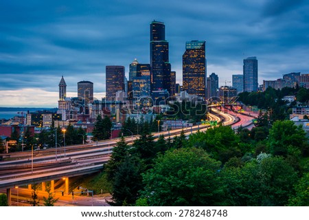 Twilight view of the Seattle skyline from the Jose Rizal Bridge, in Seattle, Washington.