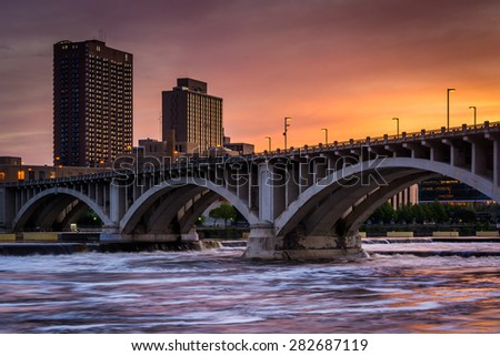 The Central Avenue Bridge and Mississippi River at sunset, in Minneapolis, Minnesota.