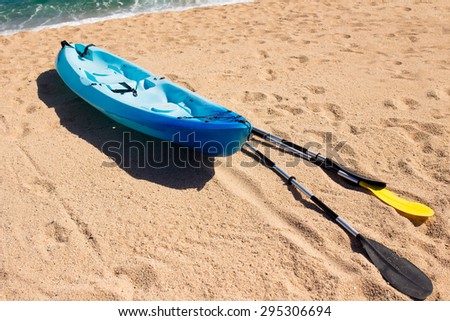 Kayak at the tropical beach. Water sport during vacation.