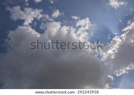 Stormy weather cloud formation and sky\'s\
blue sky with white clouds backlite.