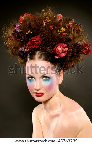 stock photo Beauty girl with a bright colored fashion makeup