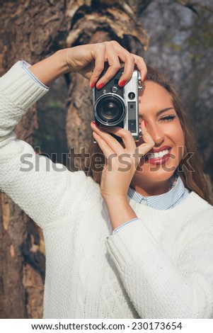Girl with old camera