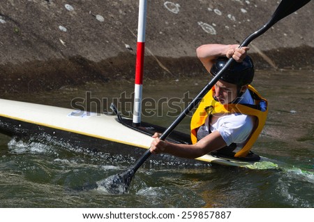 CARDINGTON, BEDFORDSHIRE, ENGLAND - AUGUST 31,2014: Man in Kayak Slalom