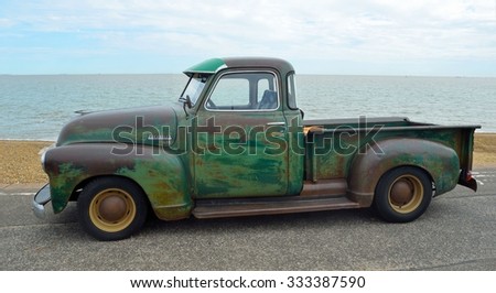 FELIXSTOWE, SUFFOLK, ENGLAND - AUGUST 29, 2015: Classic  Chevrolet 3100 pickup truck with some rust on Felixstowe seafront.
