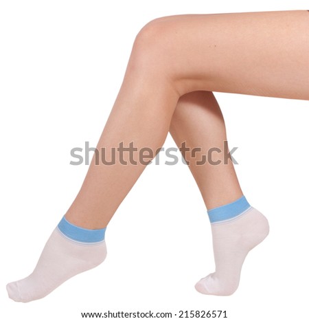 Female legs in socks. Isolated on a white background