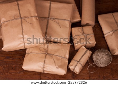 Vintage gift box package on a wooden background.