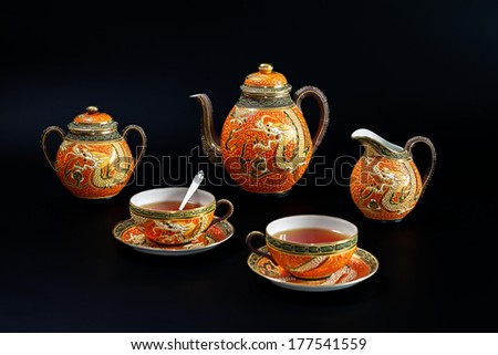 Antique Chinese tea set with dragon motif