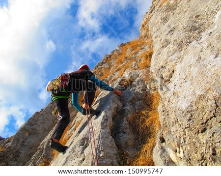 Rock climber in autumn, Bulgaria