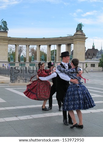 Budapest, HUNGARY - April 25, 2012: Hungarian folk dance group in front of Heroes square Budapest 2012 in Budapest, Hungary