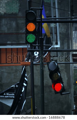 NEW ORLEANS - SEPT 1: A traffic light hangs from a power cable after it was broken due to Hurricane Gustav winds on September 1, 2008 in New Orleans.