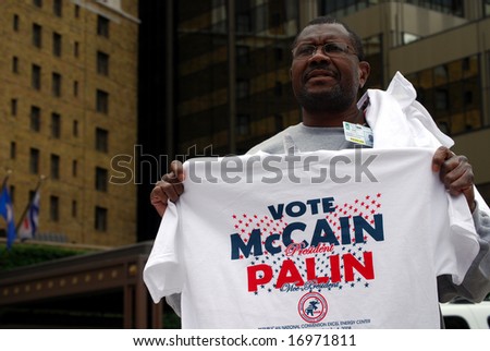 ST PAUL - SEPT 4: Allen McKoy sells McCain-Palin t-shirts outside the Republican party convention venue at the Xcel Energy Center on September 4, 2008 in St Paul, Minnesota.