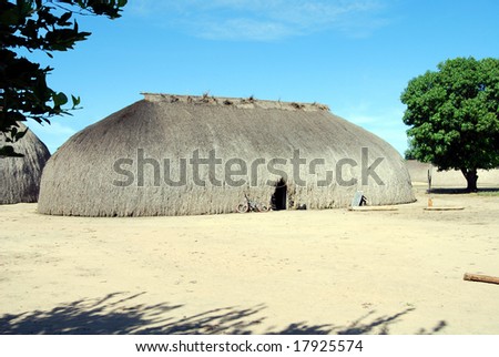 KAMAYURA VILLAGE, BRAZIL - MAY 18: The entire Kamayura tribe lives in one single village near Xingu river, in large houses covered with sape grass. Shot on May 18, 2008.