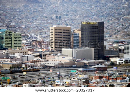 EL PASO, TEXAS - FEB 25: Downtown El Paso, Texas, with a busy border crossing and houses on the mountain ridge on the Mexican side of the border, on February 25, 2008.