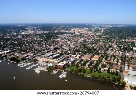 Aerial of downtown Alexandria, Virginia, on the Potomac River, near Washington DC, with a view of King Street leading from Waterfront Park to George Washington Masonic Memorial