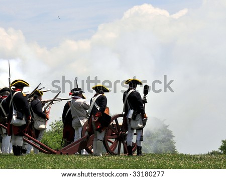 MOUNT VERNON - JULY 4: An old cannon and rifles are fired to mark Independence Day in Mount Vernon, on July 4, 2009. Mount Vernon is George Washington\'s former home and a popular tourist attraction.