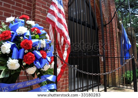 MOUNT VERNON - July 4: George Washington\'s grave in Mt Vernon, Virginia is decorated to celebrate the U.S. Independence Day on July 4, 2009. Mount Vernon is Washington\'s former home.