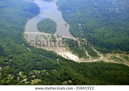 Aerial of the Great Falls National Park on the Potomac River near Washington DC. Below is Great Falls, Virginia, and behind the river is Potomac, Maryland.