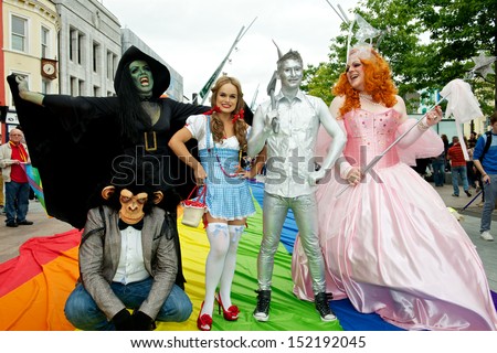 CORK, IRELAND - AUGUST 4 - Unidentified people participating in the annual Cork Gay Pride LGBT Festival Parade 2013 dressed up as characters from the Wizard of OZ, August 4, 2013, Cork, Ireland.