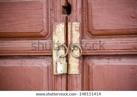 old Chinese wooden door with a lock