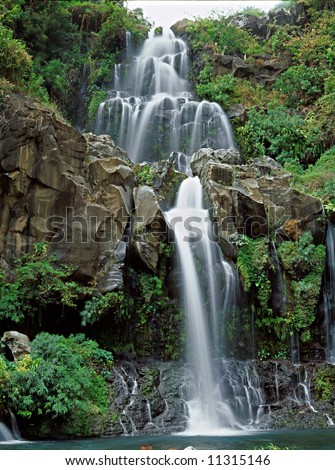 Panoramic view on beautiful waterfall in Reunion Island