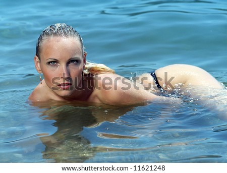 Young women swimming in Caribbean sea