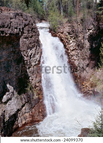 Full spring water in mountain waterfall
