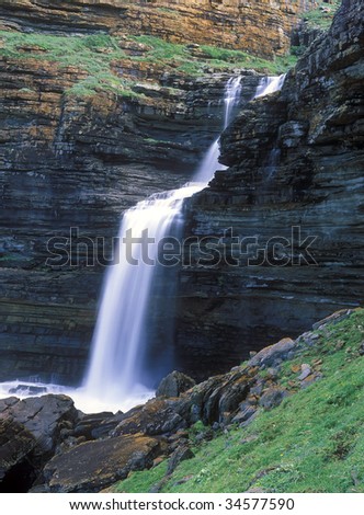 Scenic view of waterfall plunging into sea Waterfall Bluff Transkei Eastern Cape Province South Africa