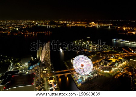 YOKOHAMA, JAPAN - FEB 18: View of Yokohama city at night in Japan on Feb 18, 2012. With 3.6 million inhabitants Yokohama is a major commercial hub of the Greater Tokyo Area.