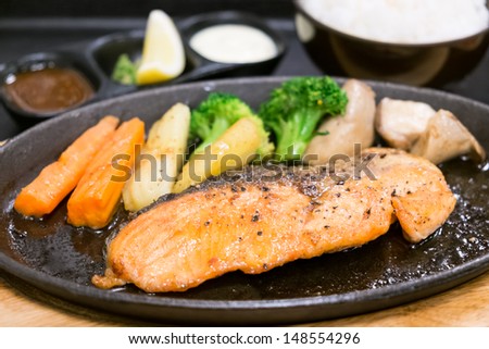 Salmon Steak with vegetable served in hot pan, Japanese food