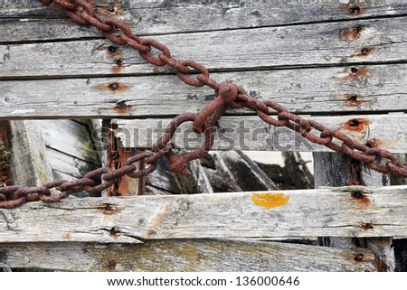 Rusty chain. Abandoned old boat detail. Old rusty chain .