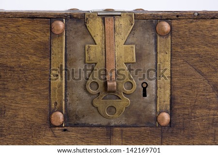 Detail of the lock of an old wooden Chest. Horizontal. Old Lock