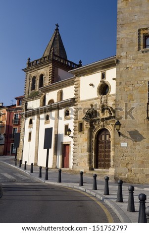 Vertical view of the facade of Collegiate of Saint John the Baptist in GijÃ?Â³n, Asturias, North Spain. Colegiata of Saint John the Baptist.