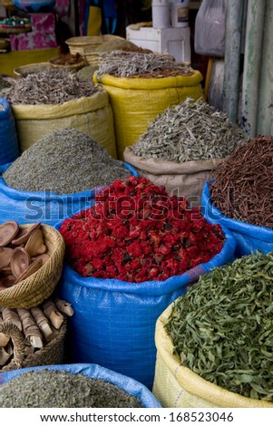 Blue filled bags in a spice market in Marrakesh, Morocco. Spices Market.