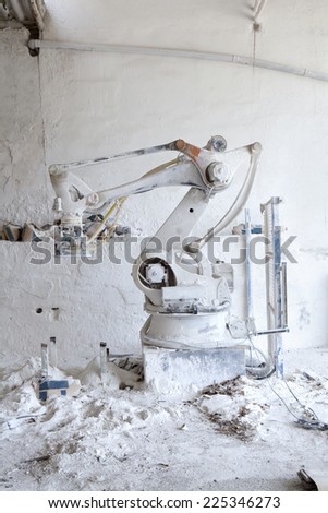 Machine covered on gypsum in a cement factory. Dirty machine.