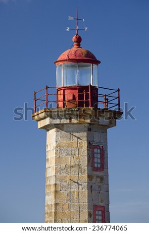 Vertical view of the Douro River Harbor Lighthouse in Porto, Portugal. Porto Lighthouse.