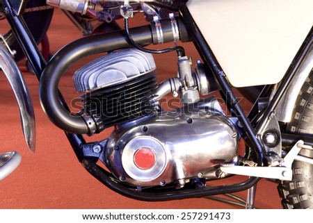 Side view of an old classic motorbike engine.\
Old motorbike engine.